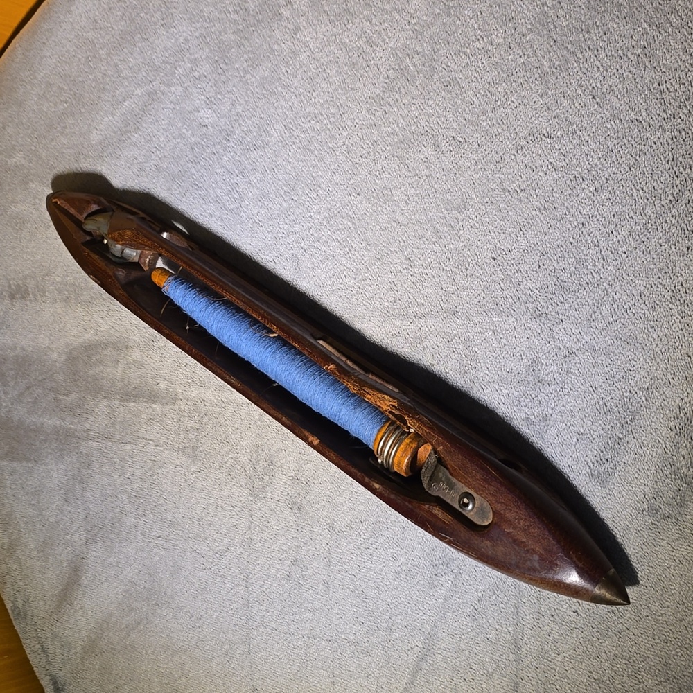 Vintage Wooden Textile Shuttle with Blue Thread on Spool